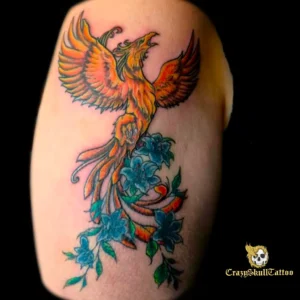 Tatouage d'un phénix prenant son envole par Crazyskulltattoo tatoueur à Poitiers